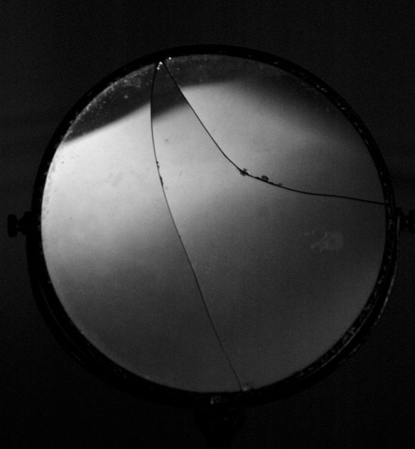 Broken vanity mirror